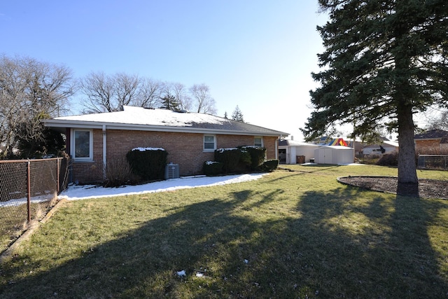 8848 Meade Ave, Oak Lawn, IL 60453 - back of house featuring central AC and brick siding