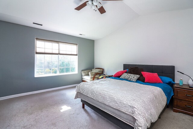 bedroom with lofted ceiling, carpet floors, a ceiling fan, and baseboards