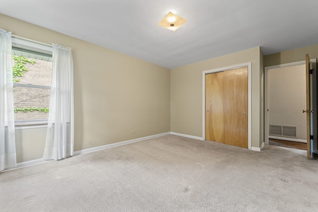 202 N Elmhurst Ave, Mount Prospect, IL 60056 - unfurnished bedroom featuring carpet flooring, baseboards, and a closet