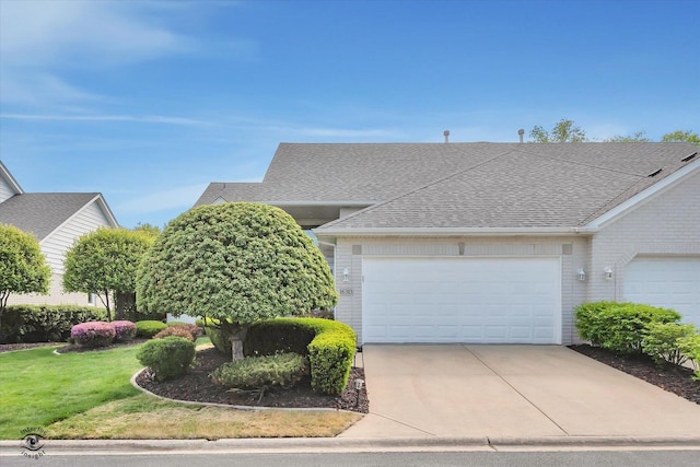 16313 Bob White Cir, Orland Park, IL 60467 - view of front of property with a garage, concrete driveway, a shingled roof, and a front yard