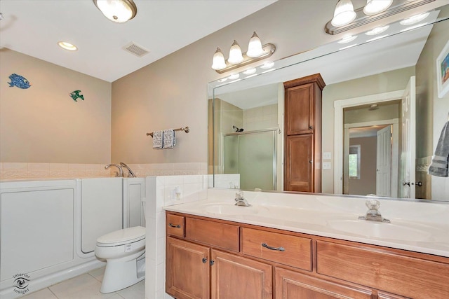 16313 Bob White Cir, Orland Park, IL 60467 - bathroom with tile patterned floors, a shower stall, double vanity, toilet, and a bath