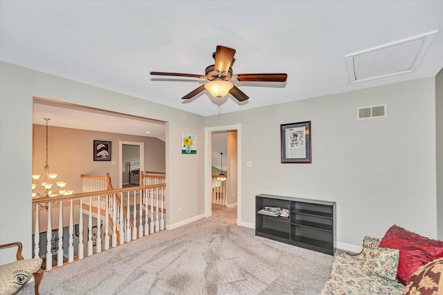 16313 Bob White Cir, Orland Park, IL 60467 - living area with carpet, baseboards, ceiling fan, and an upstairs landing