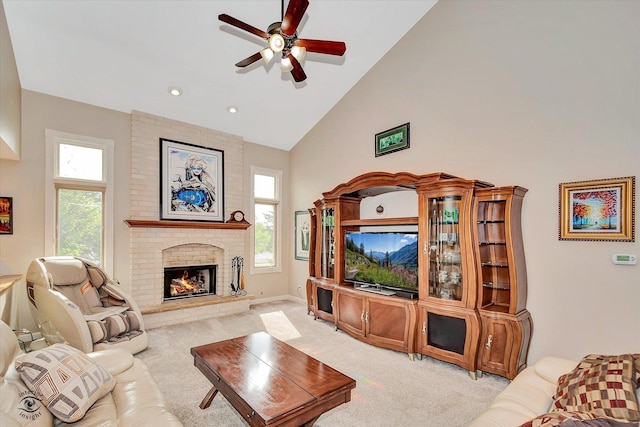 16313 Bob White Cir, Orland Park, IL 60467 - living area featuring high vaulted ceiling, a ceiling fan, plenty of natural light, light carpet, and a brick fireplace