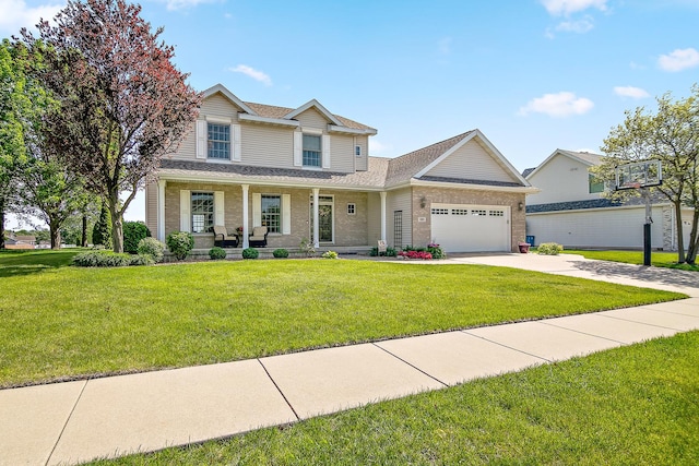 689 Revere St, Bourbonnais, IL 60914 - view of front of house with covered porch, a garage, concrete driveway, and a front yard