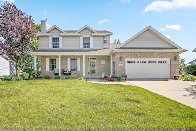 689 Revere St, Bourbonnais, IL 60914 - view of front of house featuring driveway, an attached garage, covered porch, a chimney, and a front yard