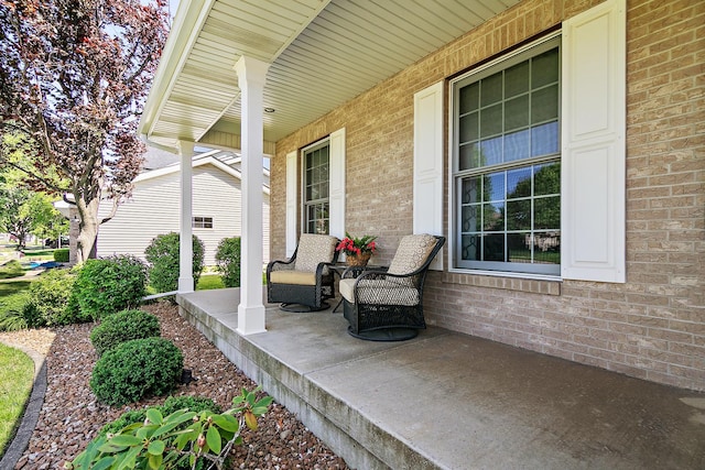 689 Revere St, Bourbonnais, IL 60914 - view of patio featuring covered porch