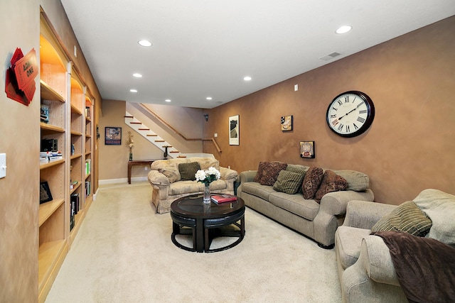 689 Revere St, Bourbonnais, IL 60914 - living room featuring light carpet, stairs, recessed lighting, and baseboards