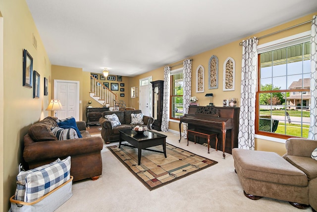 689 Revere St, Bourbonnais, IL 60914 - living area with stairs and carpet