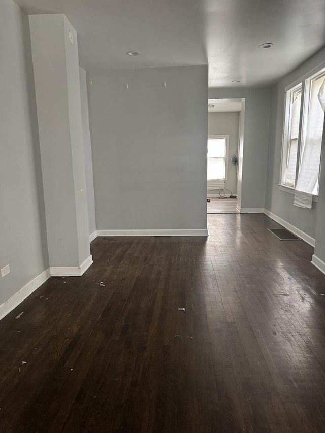 701 E 89th Pl, Chicago, IL 60619 - spare room with dark wood-style flooring and baseboards