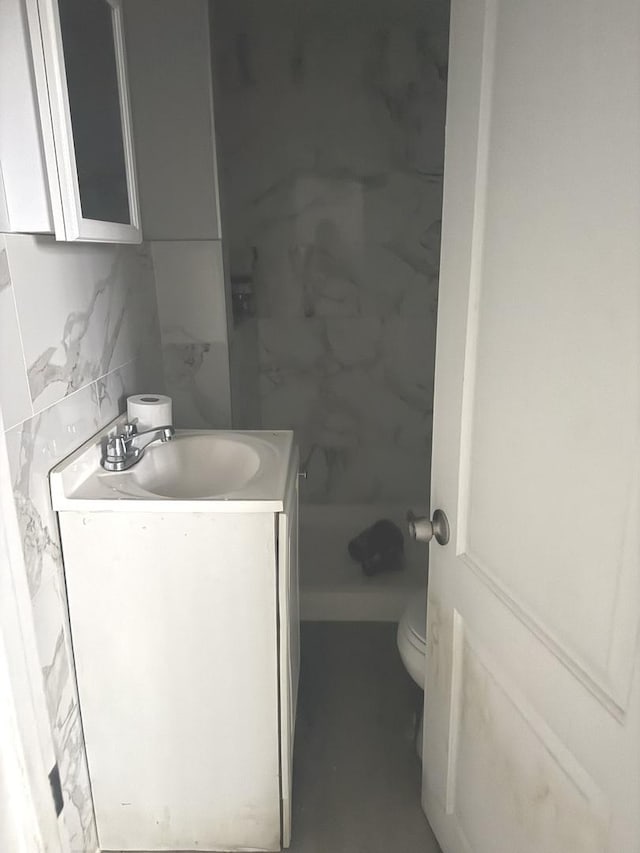 701 E 89th Pl, Chicago, IL 60619 - full bathroom with vanity, toilet, and a shower