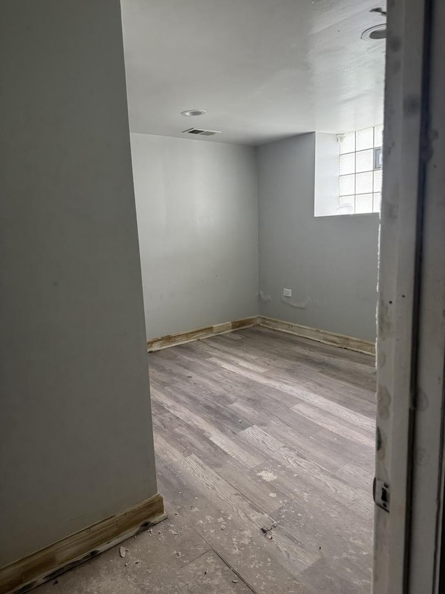 701 E 89th Pl, Chicago, IL 60619 - spare room featuring wood finished floors and baseboards
