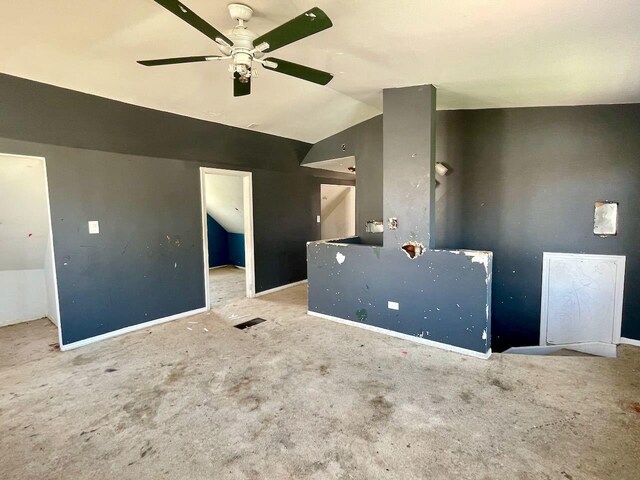 7304 W 57th St, Summit, IL 60501 - carpeted empty room with ceiling fan, vaulted ceiling, and baseboards