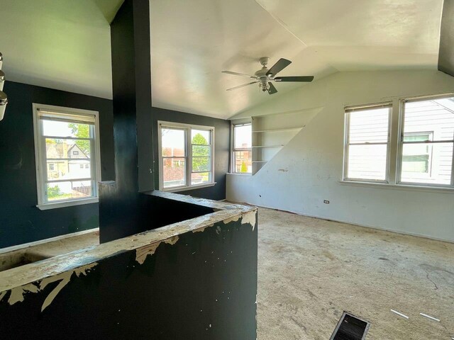 7304 W 57th St, Summit, IL 60501 - carpeted empty room featuring lofted ceiling and a ceiling fan