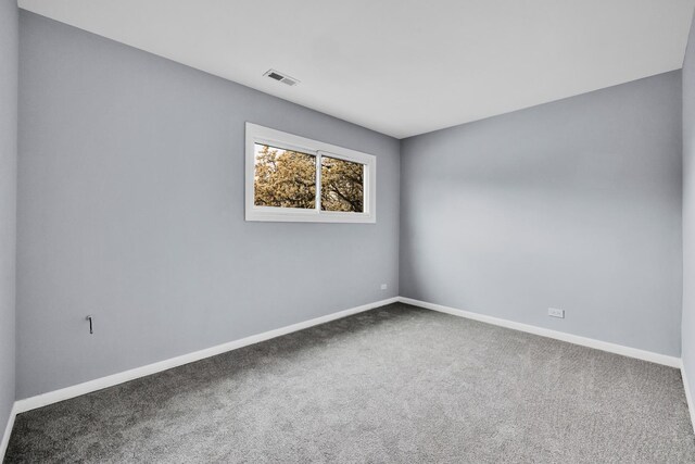 207 S Cedarcrest Dr, Schaumburg, IL 60193 - carpeted spare room with baseboards