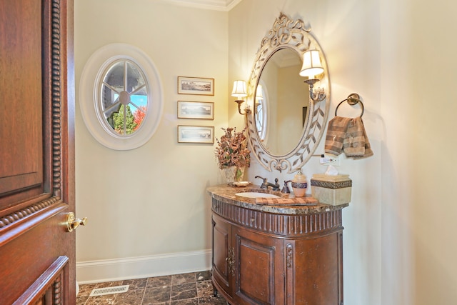64 Ridge Rd, Barrington Hills, IL 60010 - bathroom featuring baseboards, vanity, and crown molding