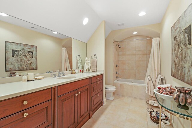 64 Ridge Rd, Barrington Hills, IL 60010 - bathroom with tile patterned flooring, tiled shower / bath, recessed lighting, vanity, and toilet