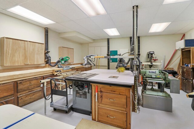 64 Ridge Rd, Barrington Hills, IL 60010 - kitchen featuring concrete floors, a drop ceiling, and brown cabinets