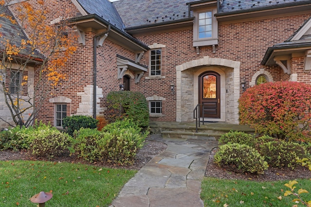 64 Ridge Rd, Barrington Hills, IL 60010 - entrance to property featuring a high end roof, brick siding, and stone siding