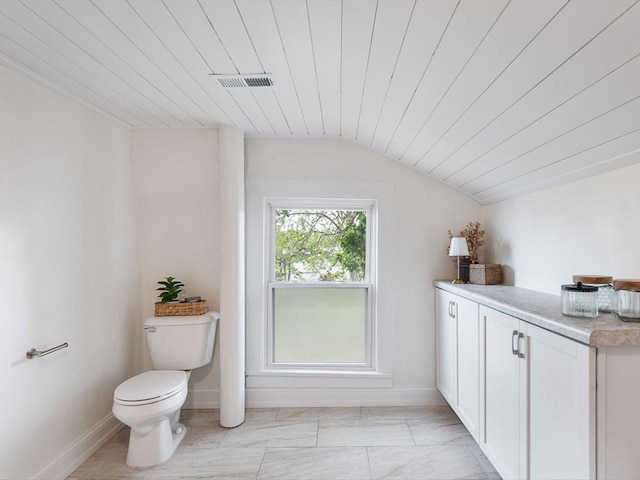 426 Reed St, Pecatonica, IL 61063 - bathroom with vaulted ceiling, toilet, baseboards, and wooden ceiling
