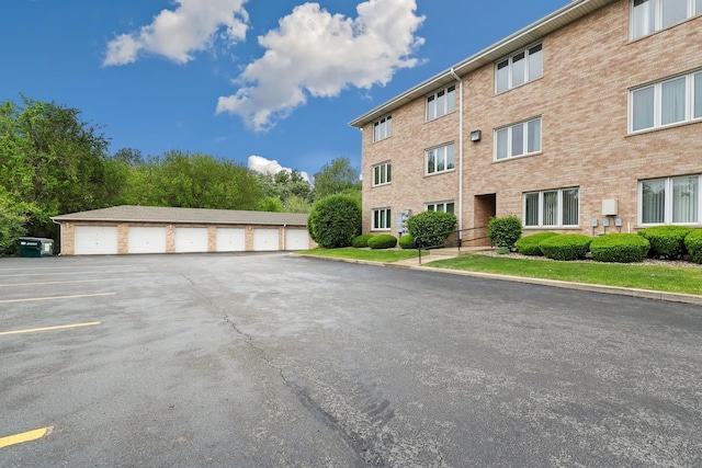 10248 SW Hwy Unit 3C, Chicago Ridge, IL 60415 - view of building exterior with community garages