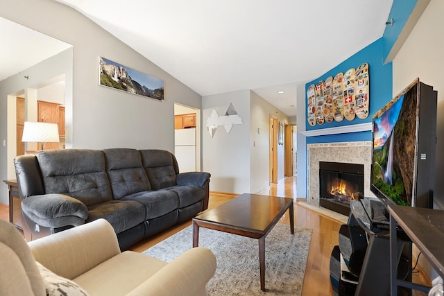 10248 SW Hwy Unit 3C, Chicago Ridge, IL 60415 - living room featuring wood finished floors, vaulted ceiling, a fireplace, and recessed lighting