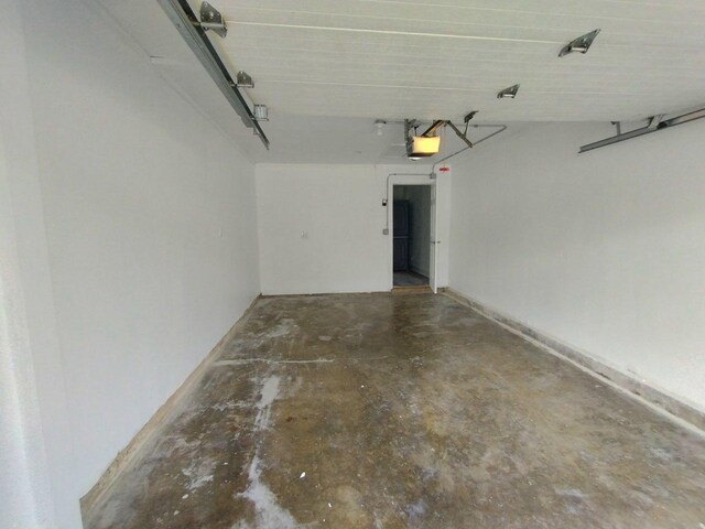 615 Hamrick Ave, Romeoville, IL 60446 - garage featuring a garage door opener