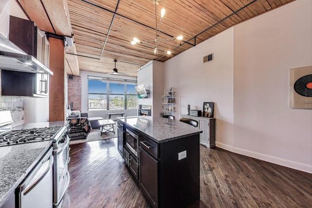2654 W Medill Ave Unit 202, Chicago, IL 60647 - kitchen featuring stainless steel appliances, wooden ceiling, dark wood-type flooring, wall chimney range hood, and open floor plan