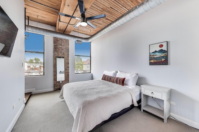 2654 W Medill Ave Unit 202, Chicago, IL 60647 - bedroom featuring carpet flooring, baseboards, and a ceiling fan
