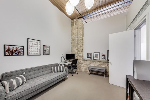 2654 W Medill Ave Unit 202, Chicago, IL 60647 - living area with carpet flooring, an office area, a towering ceiling, and wood ceiling