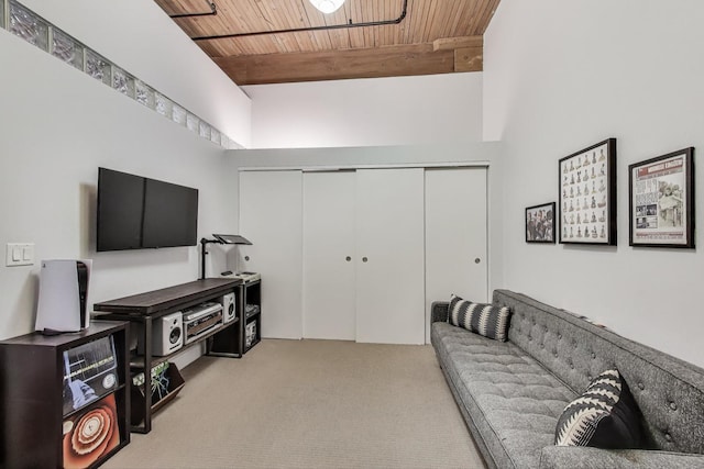 2654 W Medill Ave Unit 202, Chicago, IL 60647 - living area featuring wood ceiling, carpet floors, and beamed ceiling