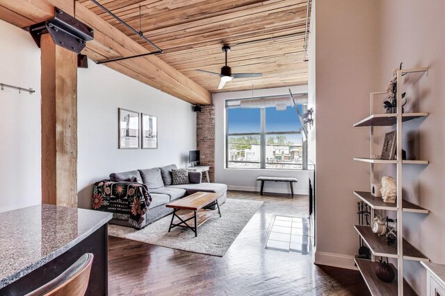 2654 W Medill Ave Unit 202, Chicago, IL 60647 - living area with wooden ceiling, a ceiling fan, dark wood-style flooring, and baseboards