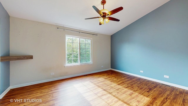 733 Fieldcrest Dr Unit A, South Elgin, IL 60177 - unfurnished room featuring lofted ceiling, wood finished floors, ceiling fan, and baseboards