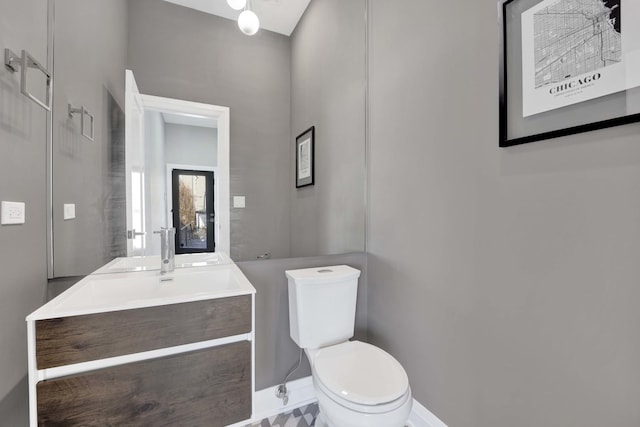 3056 N Monticello Ave, Chicago, IL 60618 - bathroom featuring toilet, vanity, and baseboards