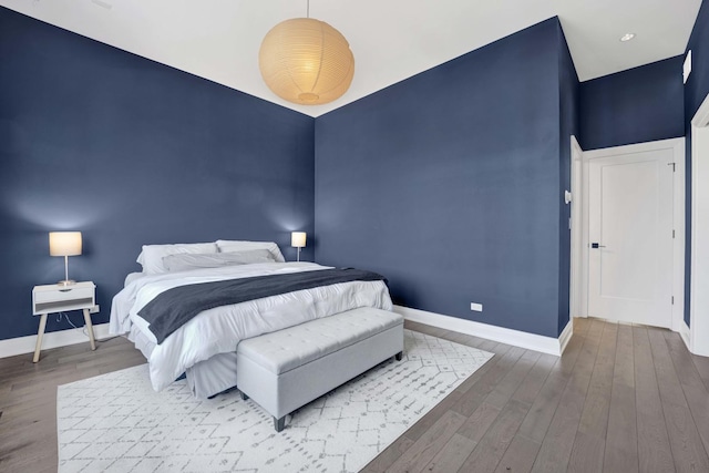 3056 N Monticello Ave, Chicago, IL 60618 - bedroom with baseboards, wood finished floors, and recessed lighting
