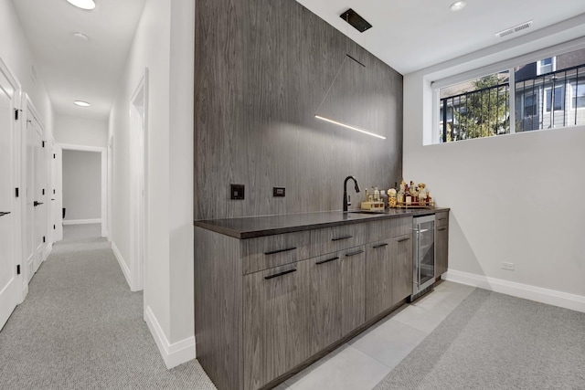 3056 N Monticello Ave, Chicago, IL 60618 - indoor wet bar featuring beverage cooler, recessed lighting, baseboards, and light carpet