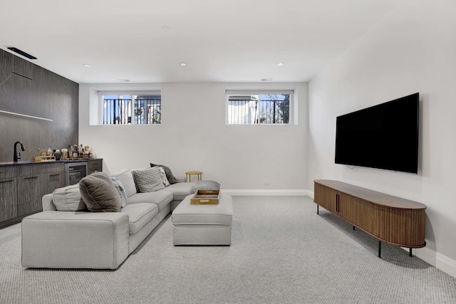 3056 N Monticello Ave, Chicago, IL 60618 - carpeted living area featuring beverage cooler, baseboards, and healthy amount of natural light