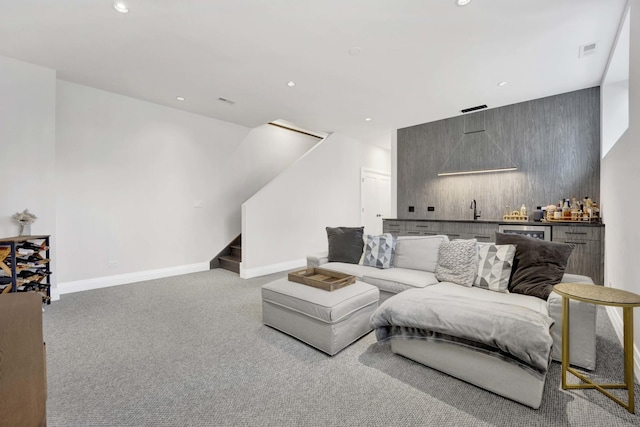 3056 N Monticello Ave, Chicago, IL 60618 - living room featuring stairway, carpet, bar with sink, recessed lighting, and baseboards