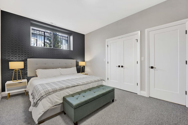 3056 N Monticello Ave, Chicago, IL 60618 - bedroom featuring carpet flooring, baseboards, and an accent wall