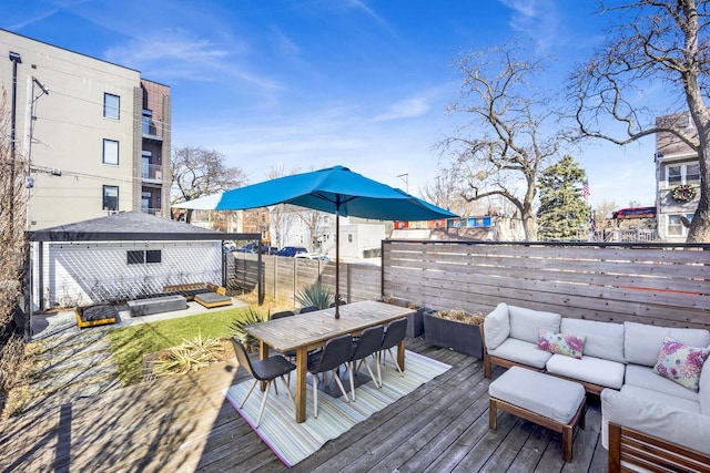 3056 N Monticello Ave, Chicago, IL 60618 - wooden deck with an outdoor living space, a fenced backyard, and outdoor dining space