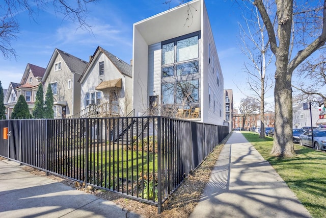 3056 N Monticello Ave, Chicago, IL 60618 - view of front of home featuring a fenced front yard and a residential view