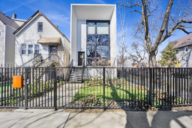 3056 N Monticello Ave, Chicago, IL 60618 - view of front facade with a fenced front yard and stairs