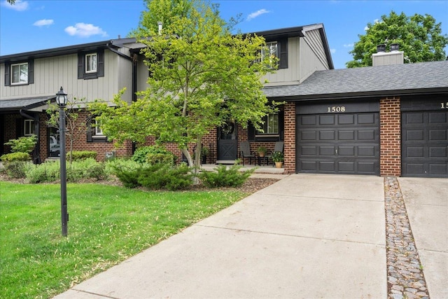 1508 Blackburn St, Wheaton, IL 60189 - view of front of house with brick siding, board and batten siding, concrete driveway, and an attached garage