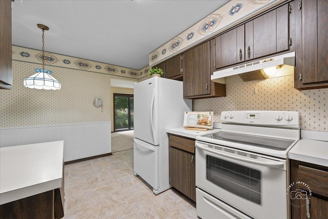 1508 Blackburn St, Wheaton, IL 60189 - kitchen with white appliances, under cabinet range hood, wallpapered walls, dark brown cabinetry, and light countertops