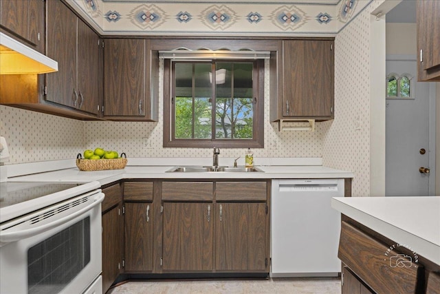 1508 Blackburn St, Wheaton, IL 60189 - kitchen featuring white appliances, a sink, light countertops, dark brown cabinetry, and wallpapered walls