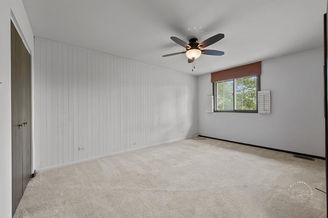 1508 Blackburn St, Wheaton, IL 60189 - empty room with a ceiling fan, carpet flooring, and baseboards