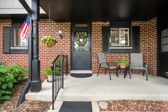 1508 Blackburn St, Wheaton, IL 60189 - view of exterior entry featuring brick siding and covered porch