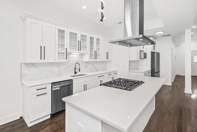 6610 S Saint Lawrence Ave, Chicago, IL 60637 - kitchen with island exhaust hood, stainless steel appliances, a sink, dark wood-type flooring, and white cabinets