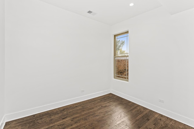 6610 S Saint Lawrence Ave, Chicago, IL 60637 - empty room featuring baseboards, dark wood-style flooring, and recessed lighting