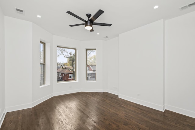 6610 S Saint Lawrence Ave, Chicago, IL 60637 - spare room featuring a ceiling fan, baseboards, dark wood-type flooring, and recessed lighting