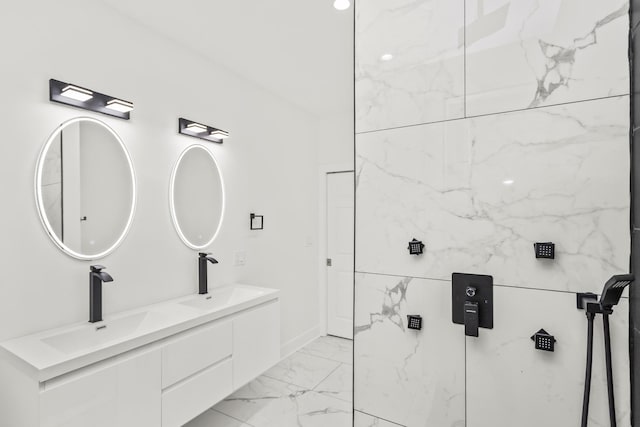 6610 S Saint Lawrence Ave, Chicago, IL 60637 - bathroom with marble look tile flooring, double vanity, and a shower